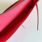 HERMES KELLY CUT 31 IN WATERMELON PINK CALFSKIN WITH SILVER HARDWARE