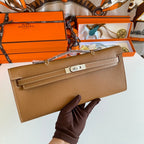 HERMES KELLY CUT 31 IN BRONZE BROWN CALFSKIN WITH SILVER HARDWARE