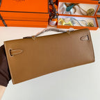 HERMES KELLY CUT 31 IN BRONZE BROWN CALFSKIN WITH GOLD HARDWARE