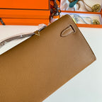 HERMES KELLY CUT 31 IN BRONZE BROWN CALFSKIN WITH GOLD HARDWARE