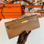 HERMES KELLY CUT 31 IN BRONZE BROWN CALFSKIN WITH GOLD HARDWARE