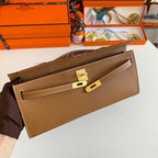 HERMES KELLY CUT 31 IN BRONZE BROWN CALFSKIN WITH GOLD HARDWARE