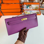 HERMES KELLY CUT 31 IN VIOLET PURPLE CALFSKIN WITH GOLD HARDWARE