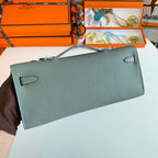 HERMES KELLY CUT 31 IN SEAFOAM GREEN CALFSKIN WITH SILVER HARDWARE