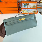 HERMES KELLY CUT 31 IN SEAFOAM GREEN CALFSKIN WITH GOLD HARDWARE