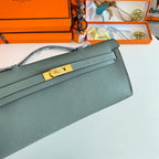 HERMES KELLY CUT 31 IN SEAFOAM GREEN CALFSKIN WITH GOLD HARDWARE