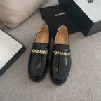 CHANEL MOASINS IN BLACK CALFSKIN GOLD METAL LOGO