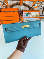 HERMES KELLY CUT 31 IN AZURE BLUE CALFSKIN WITH GOLD HARDWARE