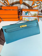 HERMES KELLY CUT 31 IN AZURE BLUE CALFSKIN WITH GOLD HARDWARE