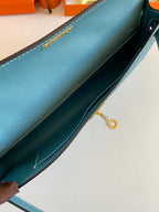 HERMES KELLY CUT 31 IN AZURE BLUE CALFSKIN WITH GOLD HARDWARE