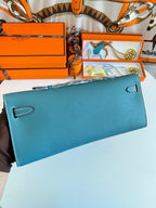 HERMES KELLY CUT 31 IN AZURE BLUE CALFSKIN WITH SILVER HARDWARE