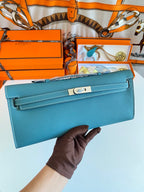 HERMES KELLY CUT 31 IN AZURE BLUE CALFSKIN WITH SILVER HARDWARE