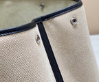 HERMES GARDEN PARTY 36CM IN WHITE TOILETS COTTON CANVAS AND BLACK CALFSKIN