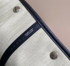 HERMES GARDEN PARTY 36CM IN WHITE TOILETS COTTON CANVAS AND BLACK CALFSKIN