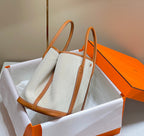 HERMES GARDEN PARTY 36CM IN WHITE TOILETS COTTON CANVAS AND BROWN CALFSKIN