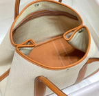 HERMES GARDEN PARTY 36CM IN WHITE TOILETS COTTON CANVAS AND BROWN CALFSKIN