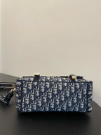 DIOR MEDIUM 28 CAMP BAG IN BLUE OBLIQUE EMBROIDERY