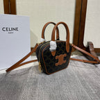 CELINE TOP HANDLE BAG 20 IN BLACK TRIOMPHE CANVAS AND BROWN CALFSKIN