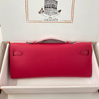 HERMES KELLY CUT 31 IN CHERRY RED CALFSKIN WITH GOLD HARDWARE