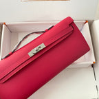 HERMES KELLY CUT 31 IN CHERRY RED CALFSKIN WITH SILVER HARDWARE