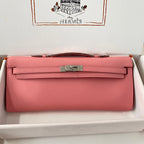 HERMES KELLY CUT 31 IN SALMON PINK CALFSKIN WITH SILVER HARDWARE