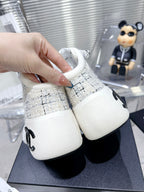 CHANEL CANO ALTO SNEAKER IN WHITE WOOL TWEED AND RUBBER