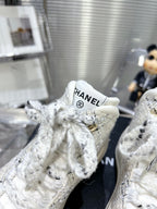 CHANEL CANO ALTO SNEAKER IN WHITE WOOL TWEED AND RUBBER