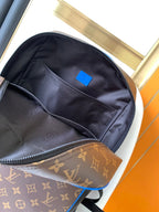 LOUIS VUITTON DEAN BACKPACK 42 IN BLUE AND BROWN MONOGRAM CANVAS