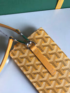 MONTMARTRE GM CASE 18 IN YELLOW GOYARDINE CANVAS