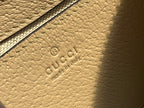 GUCCI OPHIDIA  SMALL 25 HANDBAG BEIGE AND WHITE SUPREME CANVAS
