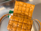 BOTTEGA VENETA CASSETTE 28 IN SANDSTONE ORANGE SOFT LAMBSKIN