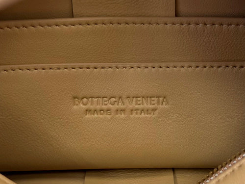 BOTTEGA VENETA BRICK CASSETTE 28 IN HARVEST GOLD CALFSKIN
