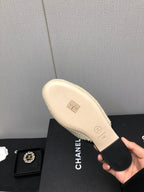 CHANEL HALF-MULES IN CREAM WOOL WOVEN
