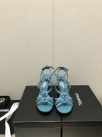 CHANEL FLORAL HIGH HEEL SANDAL IN SAPPHIRE BLUE LAMBSKIN