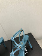 CHANEL FLORAL HIGH HEEL SANDAL IN SAPPHIRE BLUE LAMBSKIN