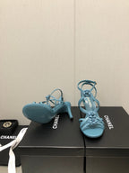 CHANEL FLORAL HIGH HEEL SANDAL IN SAPPHIRE BLUE LAMBSKIN