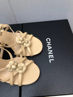 CHANEL FLORAL HIGH HEEL SANDAL IN SAND YELLOW LAMBSKIN