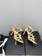 CHANEL FLORAL HIGH HEEL SANDAL IN SAND YELLOW LAMBSKIN