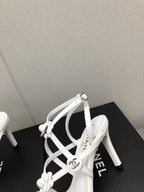 CHANEL FLORAL HIGH HEEL SANDAL IN WHITE LAMBSKIN