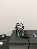 CHANEL FLORAL HIGH HEEL SANDAL IN BLACK LAMBSKIN
