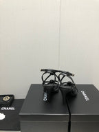 CHANEL FLORAL HIGH HEEL SANDAL IN BLACK LAMBSKIN