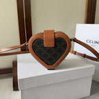 CELINE HEART TAMBOUR BAG 15 IN BLACK TRIOMPHE CANVAS AND BRONZE BROWN CALFSKIN