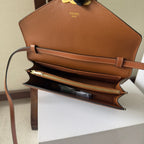 CELINE 25S WALLET MARGO 22MM IN BLACK TRIOMPHE CANVAS AND BROWN CALFSKIN