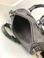 LOUIS VUITTON KEEPALL BANDOULIÈRE 21 IN MULTICOLOR CALFSKIN