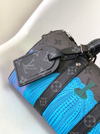LOUIS VUITTON KEEPALL BANDOULIÈRE 21 IN MULTICOLOR CALFSKIN