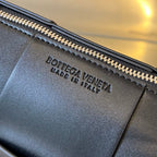 BOTTEGA VENETA SMALL CYLINDER CASSETTE 21 IN BLACK CALFSKIN