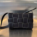 BOTTEGA VENETA SMALL CASSETTE 23 IN BLACK CANVAS AND CALFSKIN TRIM