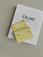 CELINE TRIOMPHE 9 WALLET TWO-IN-ONE YELLOW PASTEL CALFSKIN