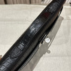 HERMES KELLY CUT 31 IN BLACK SHINY ALLIGATOR LEATHER WITH SILVER HARDWARE