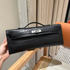HERMES KELLY CUT 31 IN BLACK SHINY ALLIGATOR LEATHER WITH SILVER HARDWARE